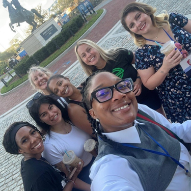 group walking to coffee at conference